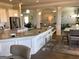 Open kitchen featuring granite countertops, island seating, and stainless appliances at 160 Elysian Dr, Fayetteville, GA 30214