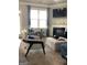 Bright living room with a fireplace, tv, and comfortable seating at 160 Elysian Dr, Fayetteville, GA 30214