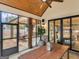Back porch featuring an outdoor dining table and sliding glass doors at 319 S Mount Carmel Rd, Mcdonough, GA 30253