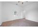 Bedroom with carpet, ceiling fan, and doorway to outside at 1993 Reynolds Sw Dr, Atlanta, GA 30315