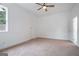 Bedroom with carpet, ceiling fan, and window at 1993 Reynolds Sw Dr, Atlanta, GA 30315