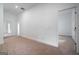 Bright bedroom with plush neutral carpeting and two entry doors at 1993 Reynolds Sw Dr, Atlanta, GA 30315