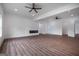 Open-concept living room with hardwood floors, recessed lighting, and neutral paint at 1993 Reynolds Sw Dr, Atlanta, GA 30315