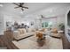 Open-concept living space features modern decor, with kitchen and dining area, filled with natural light at 1993 Reynolds Sw Dr, Atlanta, GA 30315