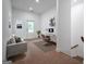 Well-lit office space with neutral carpet, a door to the outside and a built in desk at 1993 Reynolds Sw Dr, Atlanta, GA 30315