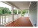 Outdoor porch with wooden decking and white railings at 1993 Reynolds Sw Dr, Atlanta, GA 30315