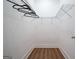 Spacious walk-in closet with shelving installed and hardwood floors at 1993 Reynolds Sw Dr, Atlanta, GA 30315