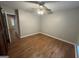Bedroom with wood floors and neutral color paint at 5761 Hancock Dr, Social Circle, GA 30025