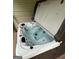 Relax in this hot tub with jets and an open cover, set up for your enjoyment and comfort at 5761 Hancock Dr, Social Circle, GA 30025