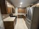 Kitchen featuring stainless steel appliances and wooden cabinets at 5761 Hancock Dr, Social Circle, GA 30025