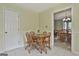 Casual eat-in kitchen featuring wood table and seating for four at 125 Drennan Dr, Fayetteville, GA 30215