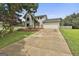 Two story house with a 2 car garage and a stone and vinyl facade at 125 Drennan Dr, Fayetteville, GA 30215