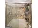Close up of a shower with decorative tile and glass door in a bathroom at 295 Pinehurst Dr, Stockbridge, GA 30281