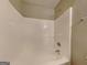 Bathroom with a tub and shower combination at 426 Summer Hill Cir, Stockbridge, GA 30281