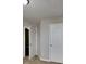 Bedroom interior with neutral colored walls and two white doors at 426 Summer Hill Cir, Stockbridge, GA 30281