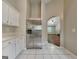 Kitchen with stainless steel refrigerator and a view into the living room at 426 Summer Hill Cir, Stockbridge, GA 30281