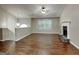 Spacious living room features vaulted ceiling, a fireplace, and wood-look floors at 426 Summer Hill Cir, Stockbridge, GA 30281
