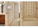 Hallway with decorative wallpaper leading to the bathroom and closets at 550 Hawthorne Dr, Fayetteville, GA 30214