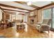 Comfortable living room with hardwood floors, fireplace, and access to multiple areas at 550 Hawthorne Dr, Fayetteville, GA 30214