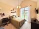 Cozy bedroom with lots of natural light from a large window, and classic decor at 10 Wigwam Cir, Whitesburg, GA 30185