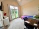 Bedroom with a large window, desk, and a vaulted ceiling offering a bright and airy feel, great for relaxation or work at 10 Wigwam Cir, Whitesburg, GA 30185