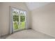 Bedroom with large window overlooking green yard at 10 Wigwam Cir, Whitesburg, GA 30185