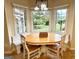 Cozy dining area with a bay window, built-in benches, and natural light at 10 Wigwam Cir, Whitesburg, GA 30185