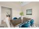 Charming dining room with a rustic wood table, elegant seating, and stylish decor at 10 Wigwam Cir, Whitesburg, GA 30185