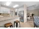 This updated kitchen features stainless steel appliances and a breakfast bar at 10 Wigwam Cir, Whitesburg, GA 30185