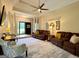 Bright living room boasts tray ceilings, hardwood floors and neutral paint at 10 Wigwam Cir, Whitesburg, GA 30185