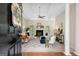 Open living room with vaulted ceiling, fireplace, and direct access to the front door at 10 Wigwam Cir, Whitesburg, GA 30185