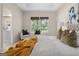 This primary bedroom features a trey ceiling, sitting area, and king-sized bed at 10 Wigwam Cir, Whitesburg, GA 30185