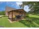 Covered patio area next to home at 10 Wigwam Cir, Whitesburg, GA 30185