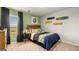 Charming bedroom with skateboard decor and a large window offering scenic outdoor views at 351 Friendship Oak Way, Hampton, GA 30228