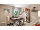 Inviting home office with neutral tones, stylish decor, and natural light through large windows at 351 Friendship Oak Way, Hampton, GA 30228