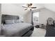 Bedroom featuring a ceiling fan, bed, and office desk at 372 Cobblestone Trl, Dallas, GA 30157