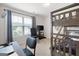 Bedroom featuring bunk beds, TV, and desk setup at 372 Cobblestone Trl, Dallas, GA 30157