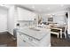 Spacious kitchen island with white cabinets and plenty of countertop space at 372 Cobblestone Trl, Dallas, GA 30157
