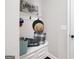 Functional mud room with bench, hooks, and storage for organization at 372 Cobblestone Trl, Dallas, GA 30157