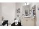 Charming powder room with granite countertops and stylish decor at 372 Cobblestone Trl, Dallas, GA 30157