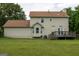 Two story home with large grassy backyard and wooden deck at 2763 Hunters Ct, Hampton, GA 30228