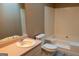 Bathroom with pink vanity, ample counter space, and white fixtures at 2763 Hunters Ct, Hampton, GA 30228
