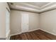 Bedroom featuring wood flooring and neutral walls at 8330 N Sterling Lakes Dr, Covington, GA 30014