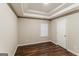 Bedroom featuring wood flooring and neutral walls at 8330 N Sterling Lakes Dr, Covington, GA 30014