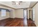 Spacious main bedroom featuring wood flooring and tray ceiling at 8330 N Sterling Lakes Dr, Covington, GA 30014