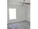 Neutral bedroom features a window and carpeted floors at 3700 Newhalem Sw St, Atlanta, GA 30331