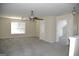 Bonus room features a ceiling fan, window, and carpet at 3700 Newhalem Sw St, Atlanta, GA 30331