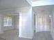 Hallway featuring an open area with chandelier and view into another room at 3700 Newhalem Sw St, Atlanta, GA 30331