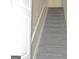Stairway has grey carpet and white trim at 3700 Newhalem Sw St, Atlanta, GA 30331