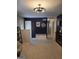 Stylish entryway featuring elegant wall decor and modern lighting at 10178 Top Tree Ct, Jonesboro, GA 30238